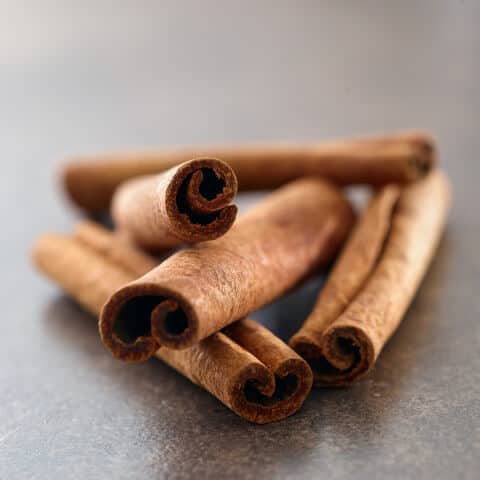 cinnamon sticks in a pile
