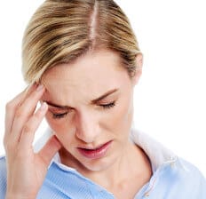 Young businesswoman has splitting headache pain migraine