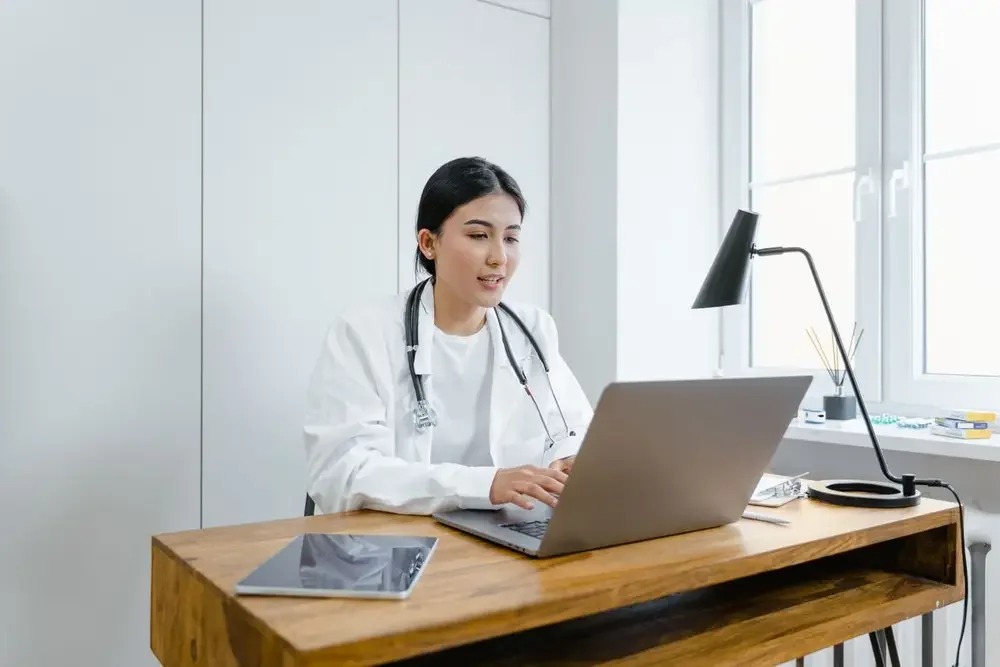 A Cellular Health Advisor reviewing results on a video call
