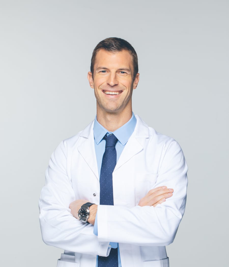 Dr. Josh Axe in a white coat