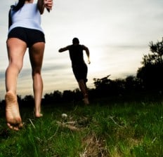Barefoot runners running
