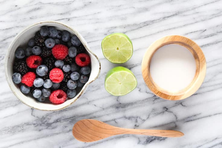 Frozen berries with coconut and lime ingredients - Dr. Axe
