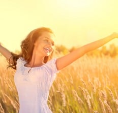 Smiling Girl Outdoors in sunshine