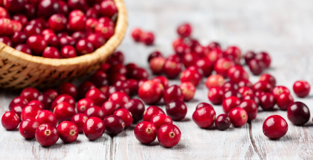 Cranberries help urinary tract infections, but not as juice