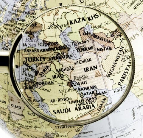 focus on middle east, Globe under magnifying glass