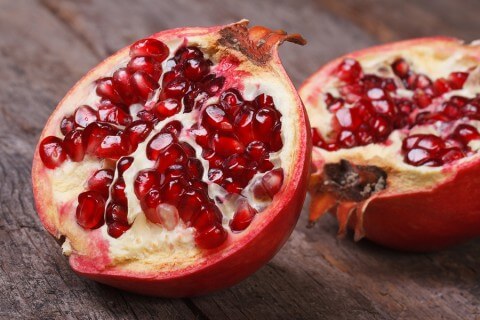 Pomegranate halved cut open