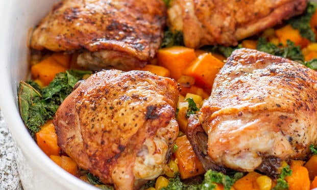 Chicken Thighs With Sweet Potatoes, Corn, and Kale Bake