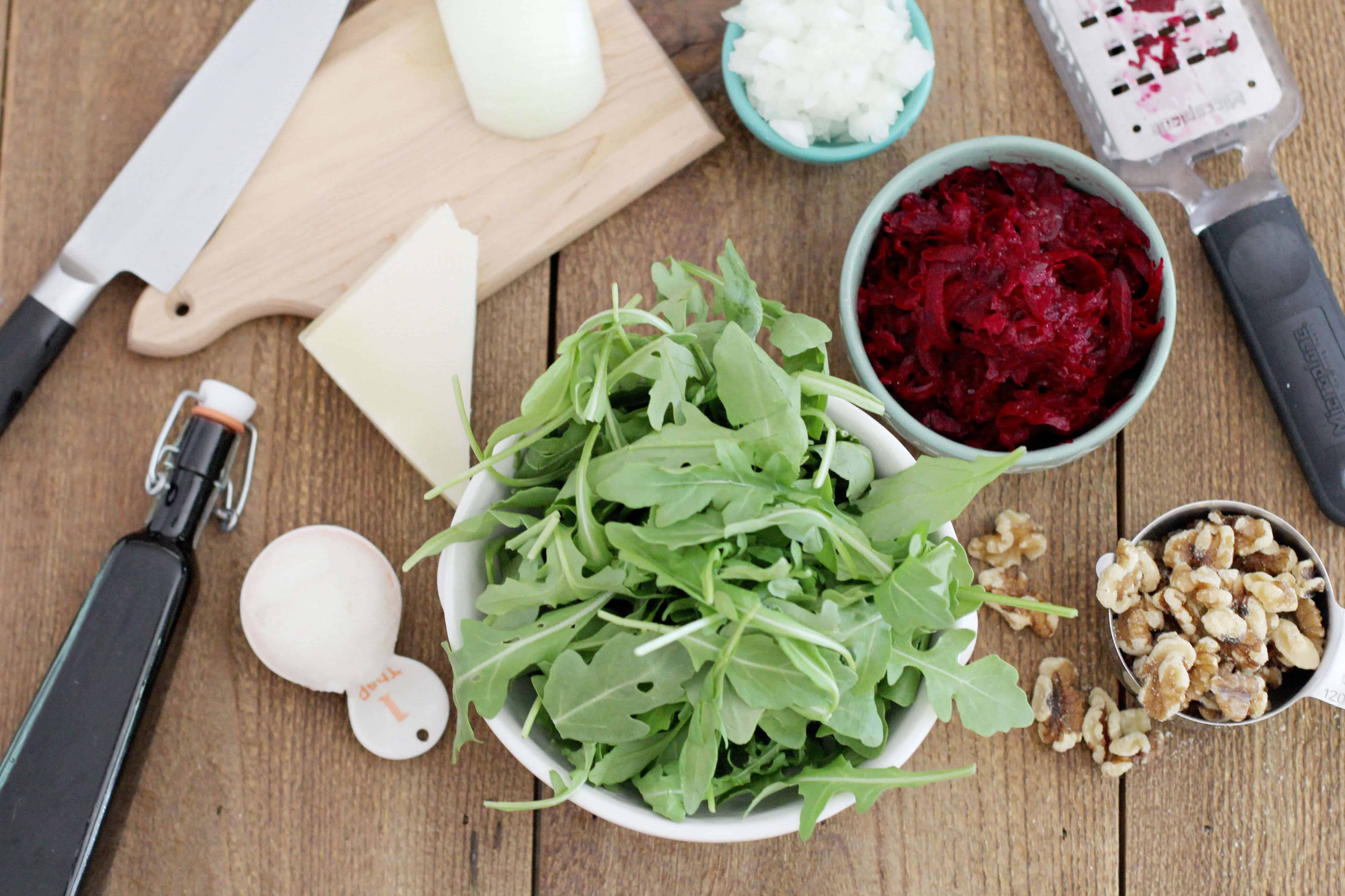 Warm arugula salad ingredients - Dr. Axe