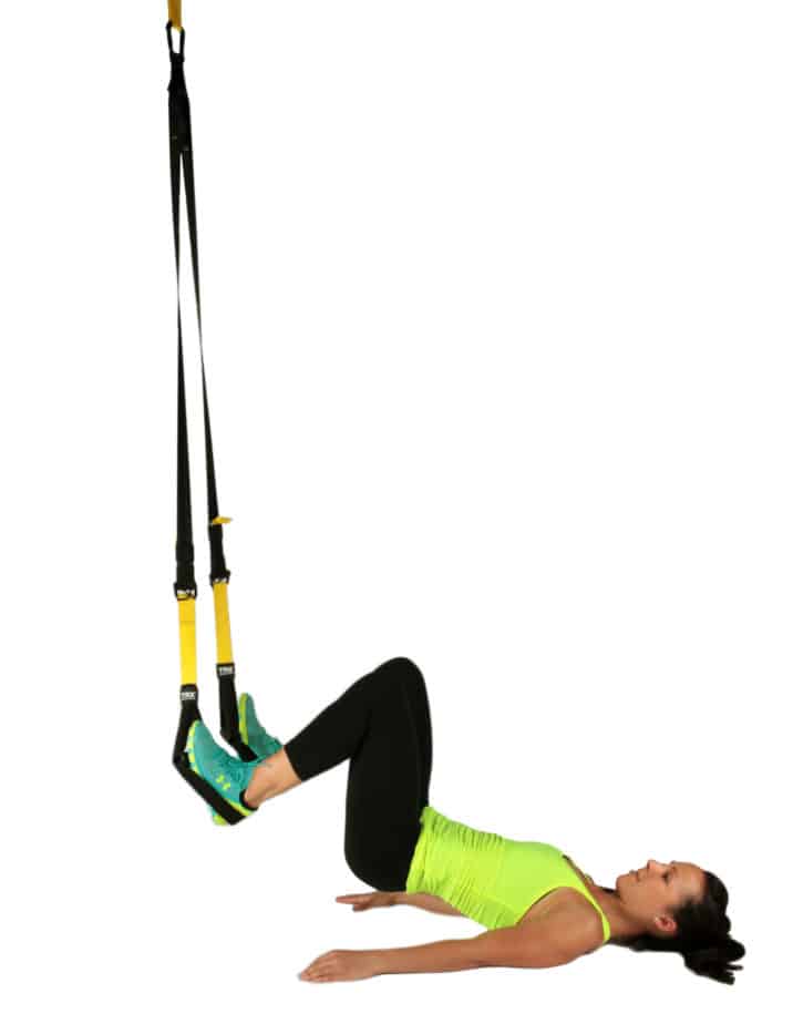 TRX exercise hamstring curl - Dr. Axe
