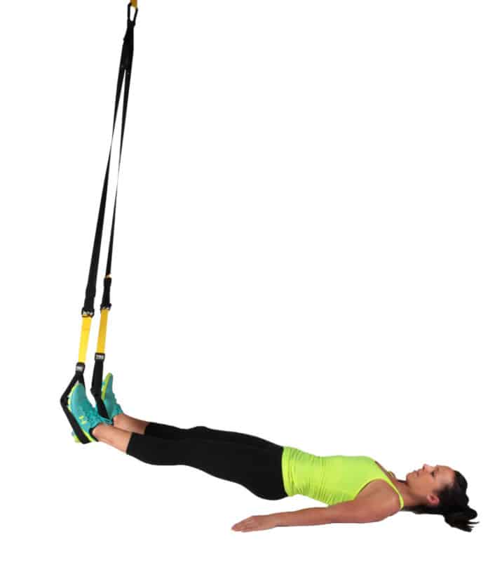 TRX exercise hamstring curl - Dr. Axe