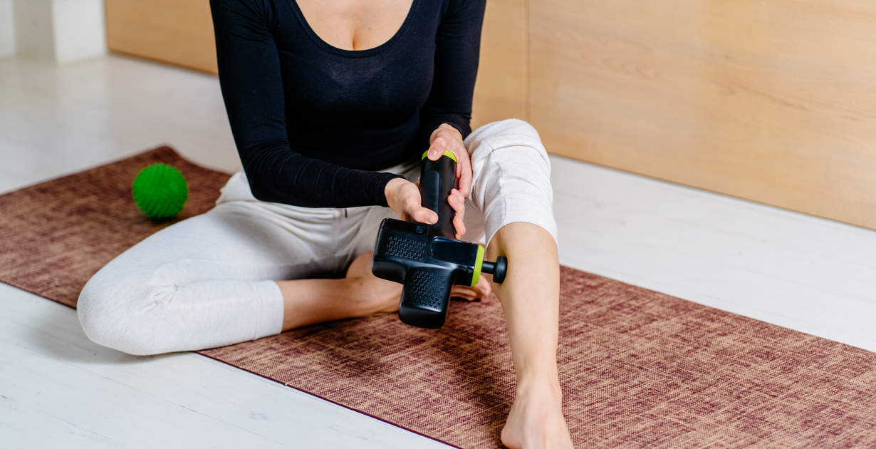 12 Massage Gun Benefits To Know About (And A Few Drawbacks)