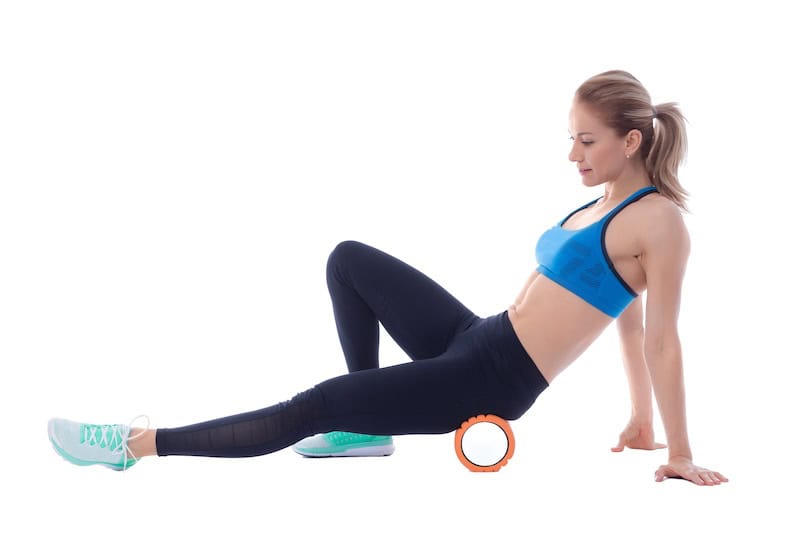 Foam rolling hamstrings and glutes